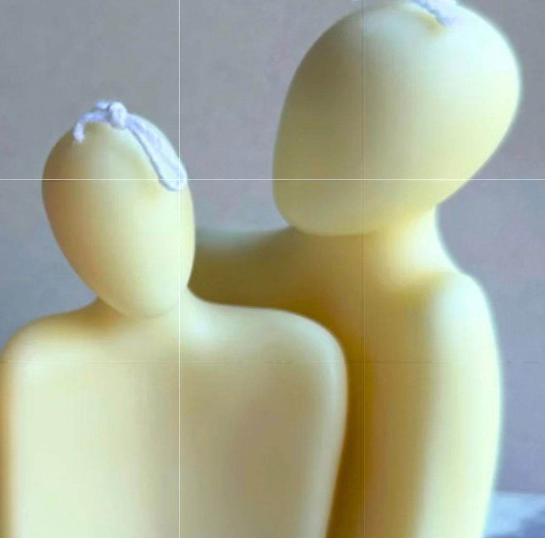 couples candle two candles shaped like a man and women