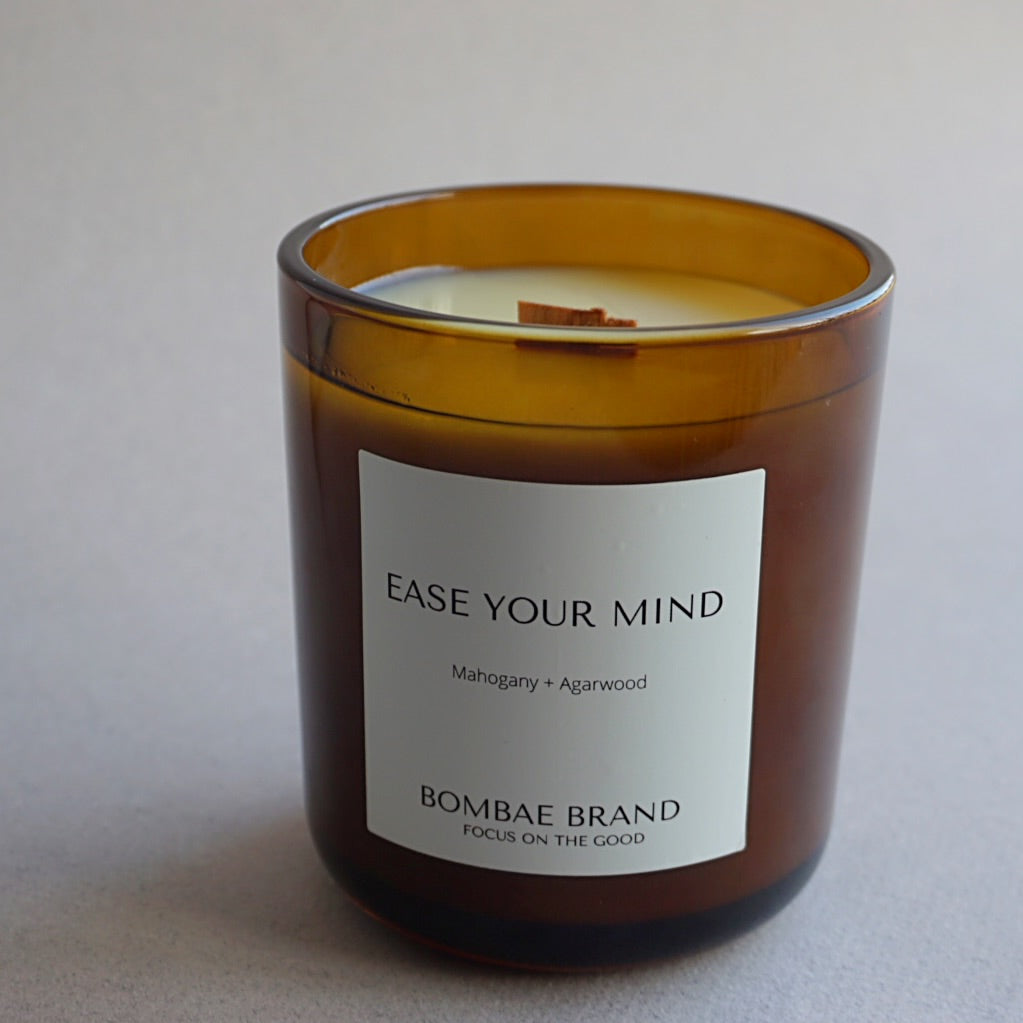 Ease Your Mind soy candle by Bombae Brand – mahogany agar wood and clove wooden wick candle