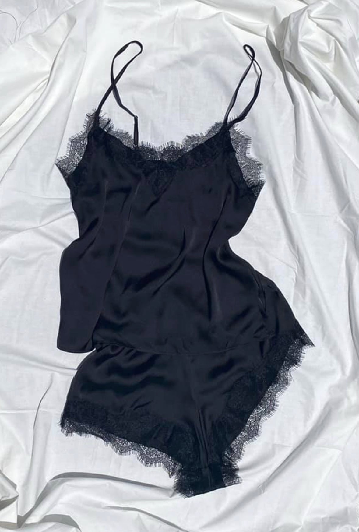 black pajama short set with lace detail